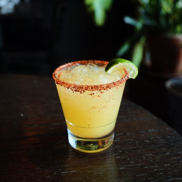 Sonora Mexican Kitchen's margarita, garnished with a chili-lime rim and a fresh lime wedge.